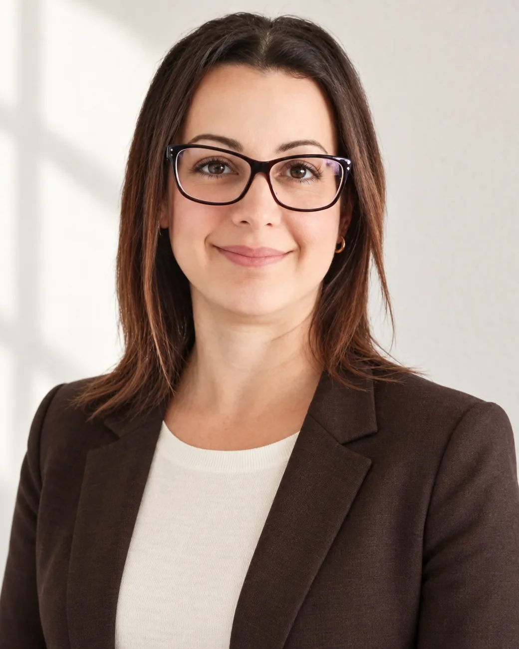 Michelle Newman | CAQA Groups A professional woman, Michelle Newman, smiles at the camera as Managing Director of CAQA Groups.