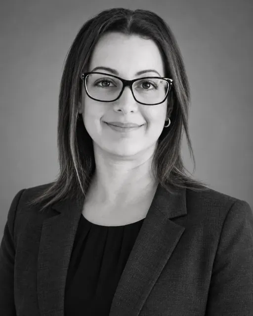 A professional headshot portrait of Michelle Newman, Managing Director at CAQA Groups.